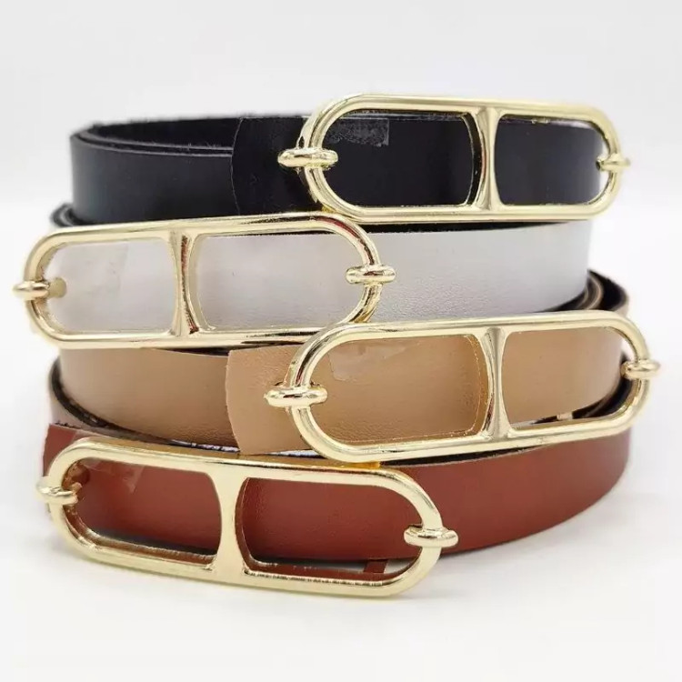 کمربند زنانه چرمی با سگک بیضی عینکی طلایی مدل مینیمال از برند درنیکا