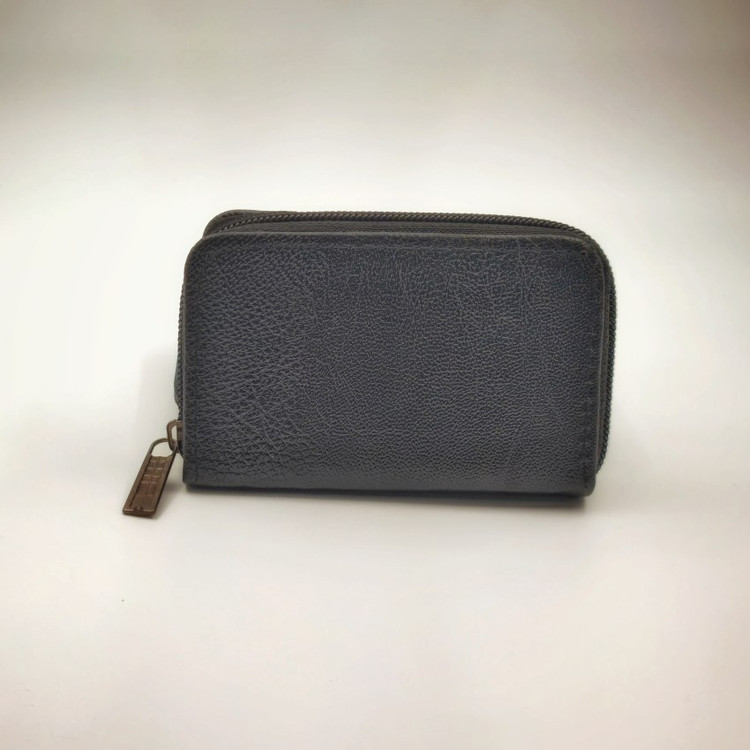 جاکارتی چرمی زیپدار مشکی با طراحی آکاردئونی، مناسب برای استایل رسمی و استفاده روزمره